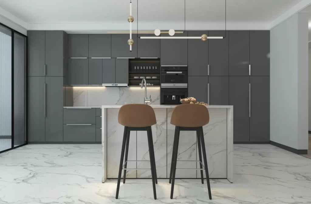 Modern kitchen with dark gray cabinetry, white marble island with two brown bar stools, and contemporary pendant lighting